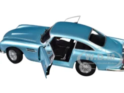 1964 Aston Martin DB5 RHD (Right Hand Drive) Light Blue Metallic 1/18 Diecast Model Car by Solido