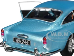 1964 Aston Martin DB5 RHD (Right Hand Drive) Light Blue Metallic 1/18 Diecast Model Car by Solido