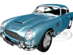 1964 Aston Martin DB5 RHD (Right Hand Drive) Light Blue Metallic 1/18 Diecast Model Car by Solido