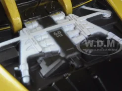 Aston Martin Vantage S V12 Yellow 1/24 Diecast Model Car Motormax 79322