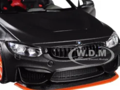 BMW M4 GTS Gray Carbon Top Orange Wheels 1/24 Diecast Model Car Maisto 31246