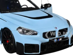 2024 BMW M2 Performance Parts Zandvoort Blue with Carbon Top and Black Stripes 1/18 Diecast Model Car by Solido