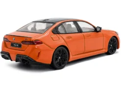 2024 BMW M5 Sedan Fire Orange III with Black Top 1/43 Diecast Model Car by Solido