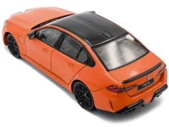 2024 BMW M5 Sedan Fire Orange III with Black Top 1/43 Diecast Model Car by Solido