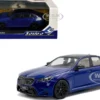 2024 BMW M5 Sedan Marina Bay Blue Metallic with Black Top 1/43 Diecast Model Car by Solido