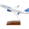 Boeing 737-800 Commercial Aircraft "United Airlines" (N37267) White with Blue Tail and Wood Stand (Snap-Fit) 1/130 Plastic Model by Skymarks