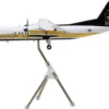 Bombardier C-147A Transport Aircraft "Golden Knights Parachute Team" United States Army (17-01610) White with Yellow Stripes and Black Tail "Gemini 200" Series 1/200 Diecast Model Airplane by GeminiJets
