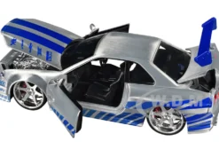 Brian's Nissan Skyline GT-R (R34) RHD (Right Hand Drive) Silver Color Brush Finish with Blue Stripes 