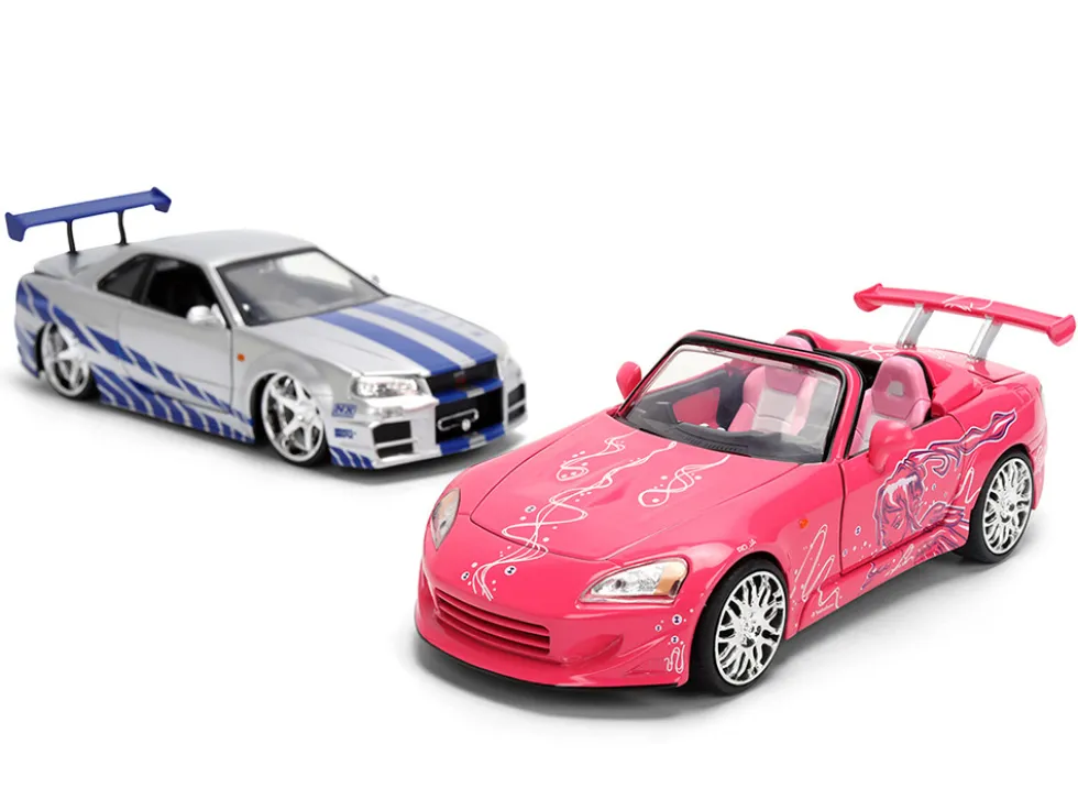Brian's Nissan Skyline GT-R (R34) Silver Metallic with Blue Stripes and Suki's Honda S2000 Pink with Graphics Set of 2 Cars "Fast & Furious 25th Anniversary" "Fast & Furious" Series 1/24 Diecast Model Cars by Jada