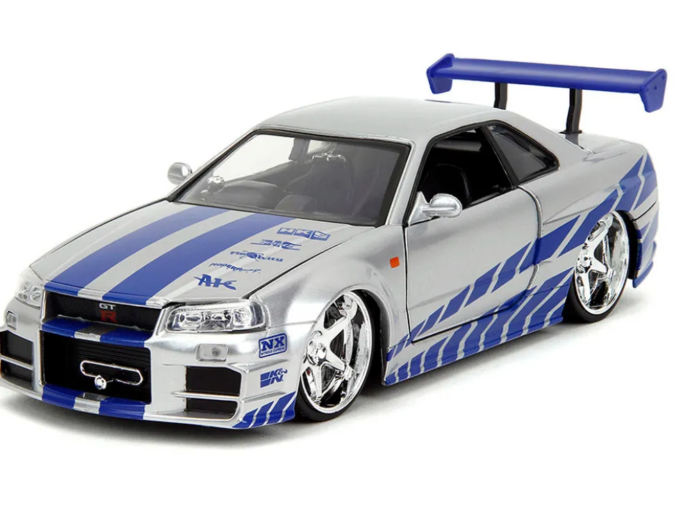 Brian's Nissan Skyline GT-R (R34) Silver Metallic with Blue Stripes and Suki's Honda S2000 Pink with Graphics Set of 2 Cars "Fast & Furious 25th Anniversary" "Fast & Furious" Series 1/24 Diecast Model Cars by Jada