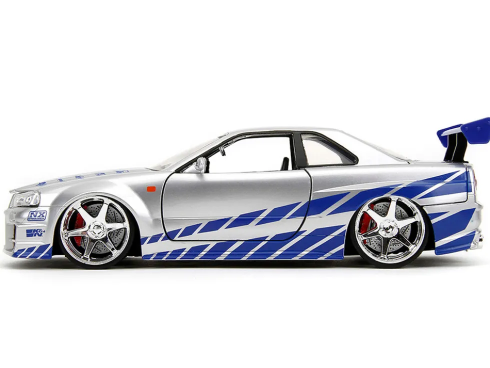 Brian's Nissan Skyline GT-R (R34) Silver Metallic with Blue Stripes and Suki's Honda S2000 Pink with Graphics Set of 2 Cars "Fast & Furious 25th Anniversary" "Fast & Furious" Series 1/24 Diecast Model Cars by Jada