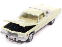 1976 Cadillac Coupe DeVille Phoenician Ivory "Luxury Cruisers" Series 1/64 Diecast Model Car by Auto World