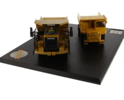 CAT Caterpillar 769 Off-Highway Truck 1963 2006 CAT Caterpillar 770 Off-Highway Truck 2007 Present with Operators Evolution Series Set of 2 pieces 1/50 Diecast Models Diecast Masters 85562