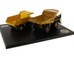 CAT Caterpillar 769 Off-Highway Truck 1963 2006 CAT Caterpillar 770 Off-Highway Truck 2007 Present with Operators Evolution Series Set of 2 pieces 1/50 Diecast Models Diecast Masters 85562