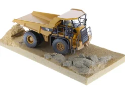 CAT Caterpillar 770 Off Highway Truck Yellow Weathered with Operator Weathered Series 1/50 Diecast Model Diecast Masters 85756