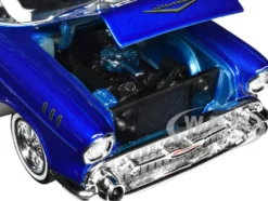 1957 Chevrolet Bel Air Lowrider Candy Blue with White Top Get Low Series 1/24 Diecast Model Car Motormax 79030bl