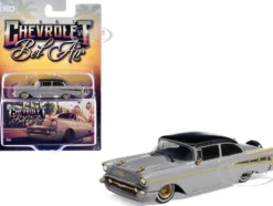 1957 Chevrolet Bel Air Lowrider Gray with Black Top and Gold Accents 1/64 Diecast Model Car by IXO Models