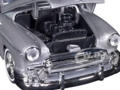 1950 Chevrolet Bel Air Lowrider Silver Metallic Blue Metallic Top Get Low Series 1/24 Diecast Model Car Motormax 79026