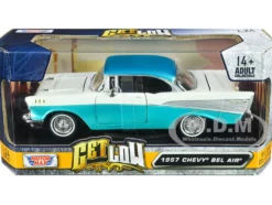1957 Chevrolet Bel Air Lowrider Turquoise Metallic White Get Low Series 1/24 Diecast Model Car Motormax 79029