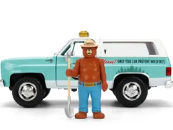 1980 Chevrolet Blazer Light Green with White Top and Graphics and Smokey Bear Diecast Figure