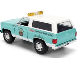1980 Chevrolet Blazer Light Green with White Top and Graphics and Smokey Bear Diecast Figure
