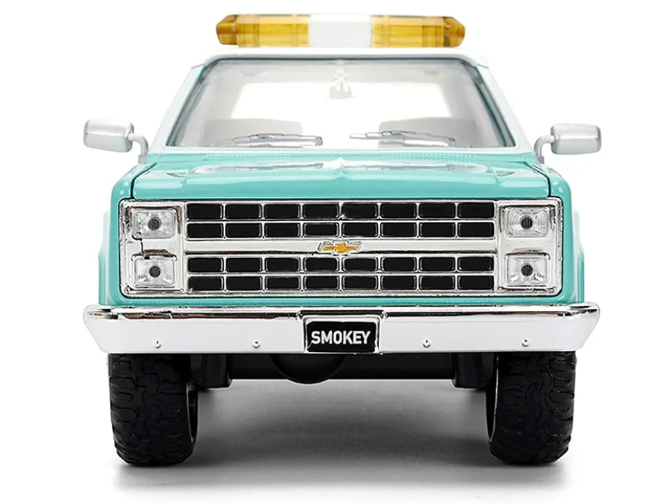 1980 Chevrolet Blazer Light Green with White Top and Graphics and Smokey Bear Diecast Figure "Smokey Bear" "Hollywood Rides" Series 1/24 Diecast Model by Jada