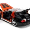 1985 Chevrolet Camaro Z 28 Orange Metallic with Graphics and Chester Cheetah Diecast Figure Cheetos Hollywood Rides Series 1/24 Diecast Model Car Jada 34384