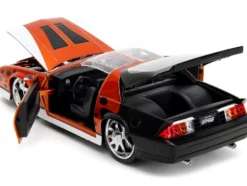 1985 Chevrolet Camaro Z 28 Orange Metallic with Graphics and Chester Cheetah Diecast Figure Cheetos Hollywood Rides Series 1/24 Diecast Model Car Jada 34384