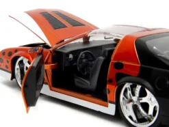 1985 Chevrolet Camaro Z 28 Orange Metallic with Graphics and Chester Cheetah Diecast Figure Cheetos Hollywood Rides Series 1/24 Diecast Model Car Jada 34384