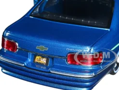 1993 Chevrolet Caprice Lowrider Blue Metallic Graphics Get Low Series 1/24 Diecast Model Car Motormax 79022