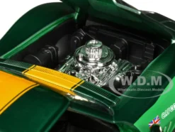 1969 Chevrolet Corvette Stingray ZL1 Green Metallic with Yellow Stripes and Cammy Diecast Figure Street Fighter Video Game Anime Hollywood Rides Series 1/24 Diecast Model Car Jada 30837