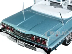 1963 Chevrolet Impala Convertible Light Blue Metallic with White Interior NEX Models 1/24 Diecast Model Car Welly 22434W-BL