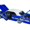 1964 Chevrolet Impala Lowrider Hard Top Candy Blue Metallic Cream Top Get Low Series 1/24 Diecast Model Car Motormax 79021