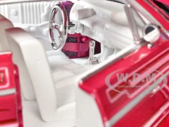 1964 Chevrolet Impala SS Lowrider Pink with Graphics and White Interior 