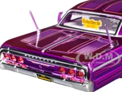 1964 Chevrolet Impala SS Lowrider Candy Purple with Graphics and White Interior 