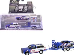 1986 Chevrolet K5 Blazer Blue and White and 1969 Chevrolet Camaro #5 Blue and White "Kyle Larson - Hendrick Motorsports" with Tandem Car Trailer "Racing Hitch & Tow" Series 6 1/64 Diecast Model Cars by Greenlight