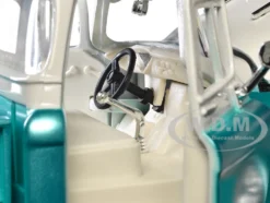 1957 Chevrolet 3100 Stepside Pickup Truck Lowrider Turquoise Metallic and White with White Interior Get Low Series 1/24 Diecast Model Car Motormax 79032tur