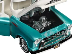 1957 Chevrolet 3100 Stepside Pickup Truck Lowrider Turquoise Metallic and White with White Interior Get Low Series 1/24 Diecast Model Car Motormax 79032tur