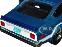 1974 Chevrolet Vega GT Blue Metallic with White Stripes Forgotten Classics Series 1/24 Diecast Model Car Motormax 79048BL