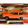 1974 Chevrolet Vega GT Orange Metallic with White Stripes Forgotten Classics Series 1/24 Diecast Model Car Motormax 79048OR