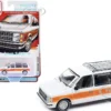 1985 Dodge Caravan Van White with Woodgrain Side Panels "Mighty Minivans" Series 1/64 Diecast Model Car by Auto World