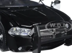 2011 Dodge Charger Pursuit Police Car Black and White with Flashing Light Bar, Front and Rear Lights and 2 Sounds 1/24 Diecast Model Car Motormax 79533