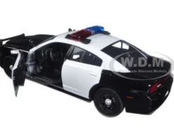 2011 Dodge Charger Pursuit Police Car Black and White with Flashing Light Bar, Front and Rear Lights and 2 Sounds 1/24 Diecast Model Car Motormax 79533