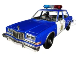 1986 Dodge Diplomat Royal Canadian Mounted Police Metallic Blue White 1/24 Diecast Model Car Motormax 76484