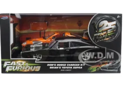 Dom's 1970 Dodge Charger R/T Black and Brian's Toyota Supra Orange with Graphics Set of 2 Cars