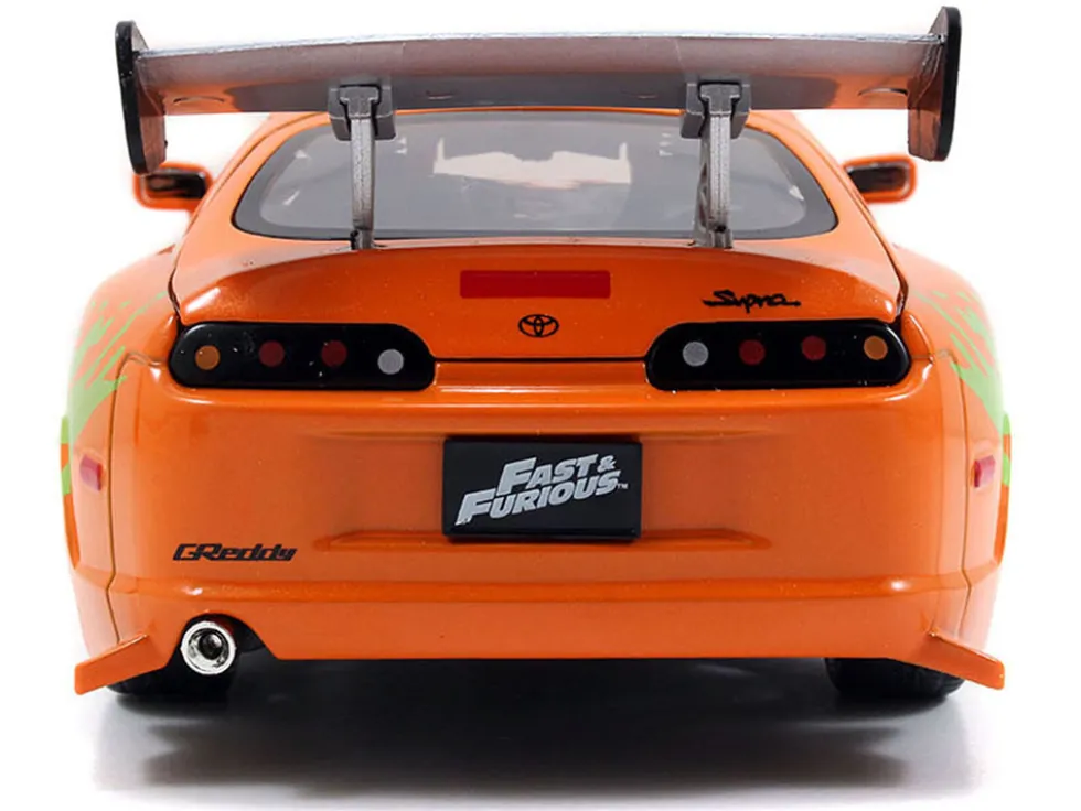 Dom's 1970 Dodge Charger R/T Black and Brian's Toyota Supra Orange with Graphics Set of 2 Cars "Fast & Furious 25th Anniversary" "Fast & Furious" Series 1/24 Diecast Model Cars by Jada