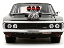 Dom's 1970 Dodge Charger R/T Black and Brian's Toyota Supra Orange with Graphics Set of 2 Cars