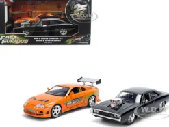 Dom's 1970 Dodge Charger R/T Black and Brian's Toyota Supra Orange with Graphics Set of 2 Cars