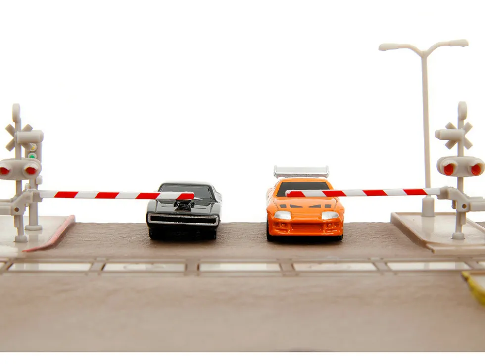 Fast & Furious Final Race Diorama with Toyota Supra Orange and Dodge Charger Black Nano Scene Series model Jada 34915
