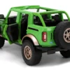 2021 Ford Bronco Green with Black Stripes and Green M&M's Diecast Figure "Hollywood Rides" Series 1/24 Diecast Model Car by Jada